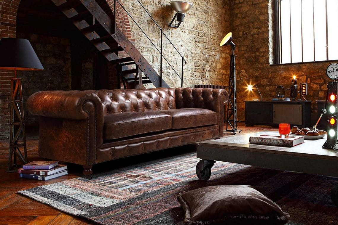 canape chesterfield dans un salon - decoration interieure